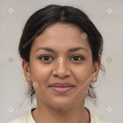 Joyful latino young-adult female with medium  brown hair and brown eyes