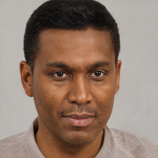 Neutral black young-adult male with short  brown hair and brown eyes