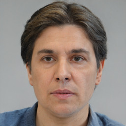 Neutral white adult male with short  brown hair and brown eyes