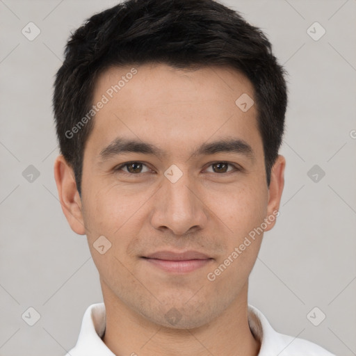 Joyful white young-adult male with short  black hair and brown eyes