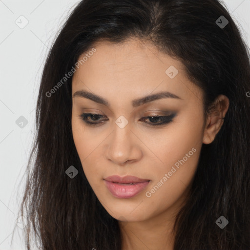 Joyful latino young-adult female with long  brown hair and brown eyes