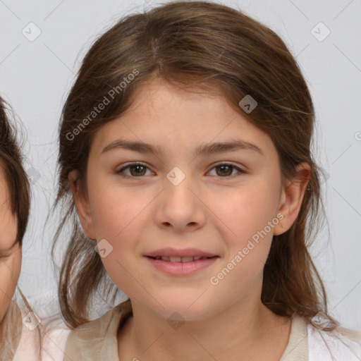 Joyful white child female with medium  brown hair and brown eyes