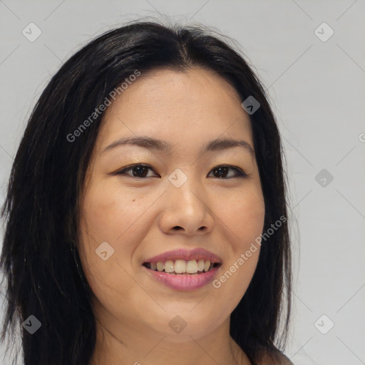 Joyful asian young-adult female with long  brown hair and brown eyes