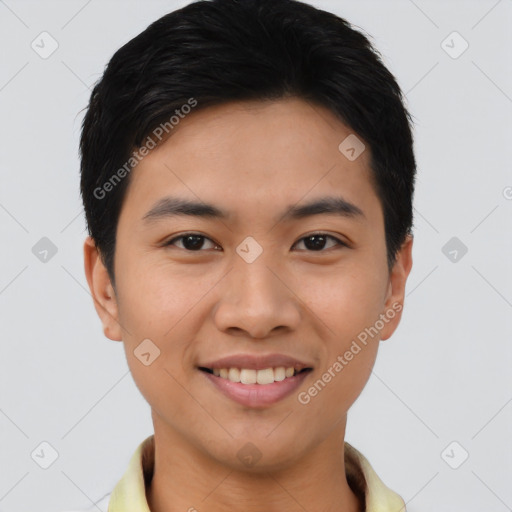 Joyful asian young-adult male with short  black hair and brown eyes