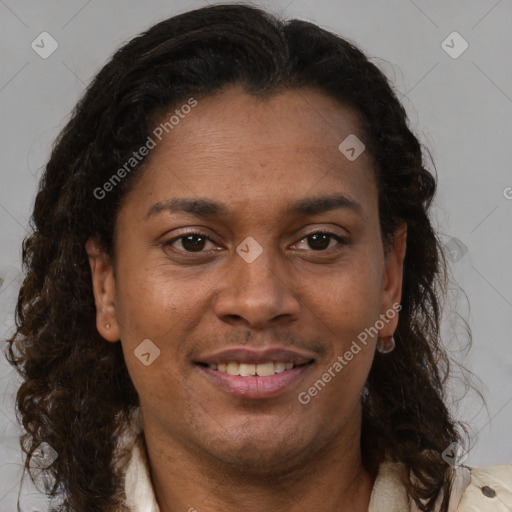 Joyful black adult female with medium  brown hair and brown eyes