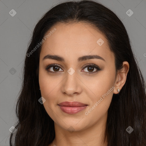 Joyful latino young-adult female with long  brown hair and brown eyes