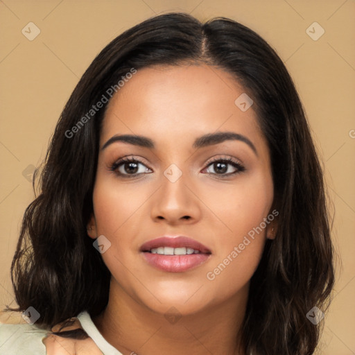 Joyful latino young-adult female with long  black hair and brown eyes