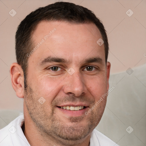 Joyful white adult male with short  brown hair and brown eyes