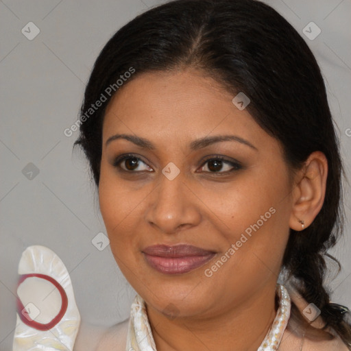 Joyful black young-adult female with medium  brown hair and brown eyes