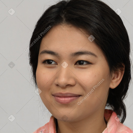 Joyful asian young-adult female with medium  brown hair and brown eyes