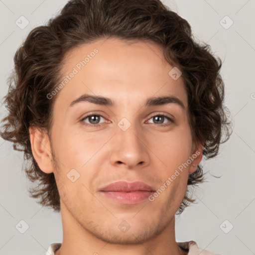 Joyful white young-adult male with medium  brown hair and brown eyes