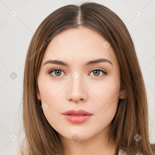 Neutral white young-adult female with long  brown hair and brown eyes