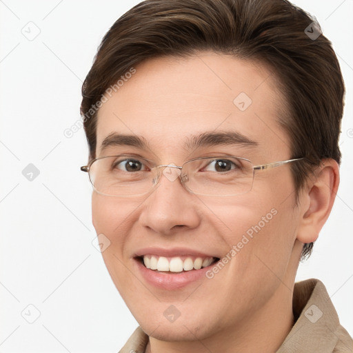 Joyful white young-adult female with short  brown hair and brown eyes