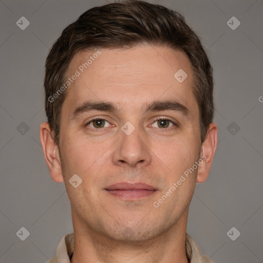 Joyful white adult male with short  brown hair and grey eyes