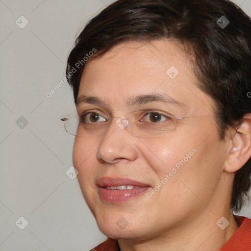 Joyful white adult female with medium  brown hair and brown eyes