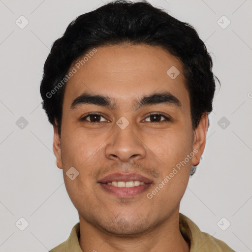 Joyful white young-adult male with short  black hair and brown eyes