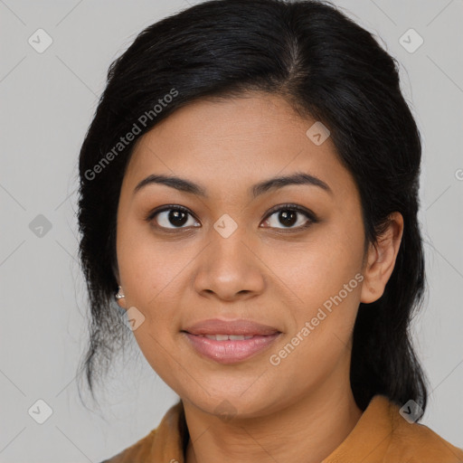 Joyful latino young-adult female with medium  black hair and brown eyes