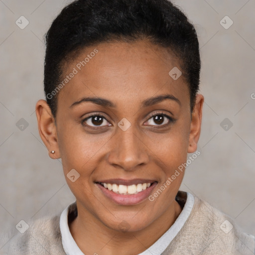 Joyful black young-adult female with short  brown hair and brown eyes