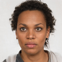 Neutral black young-adult female with short  brown hair and brown eyes