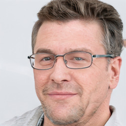 Neutral white adult male with short  brown hair and grey eyes
