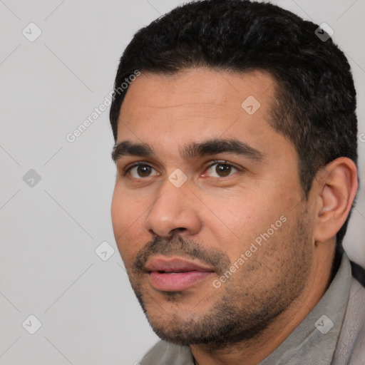 Neutral white young-adult male with short  black hair and brown eyes