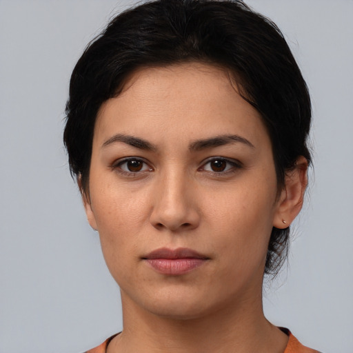 Neutral white young-adult female with medium  black hair and brown eyes