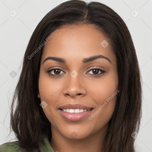 Joyful latino young-adult female with long  brown hair and brown eyes