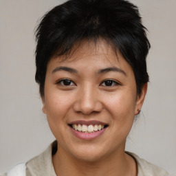 Joyful asian young-adult female with short  brown hair and brown eyes