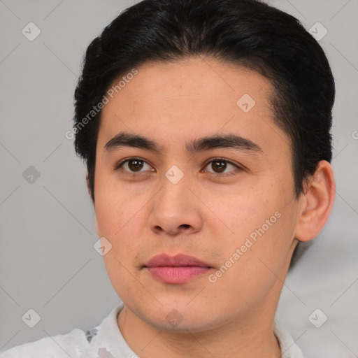 Joyful asian young-adult male with short  black hair and brown eyes