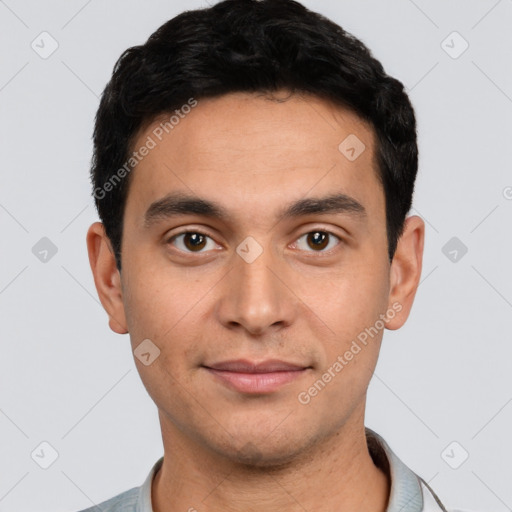 Joyful white young-adult male with short  black hair and brown eyes