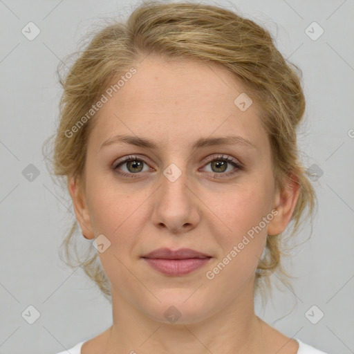 Joyful white young-adult female with medium  brown hair and blue eyes