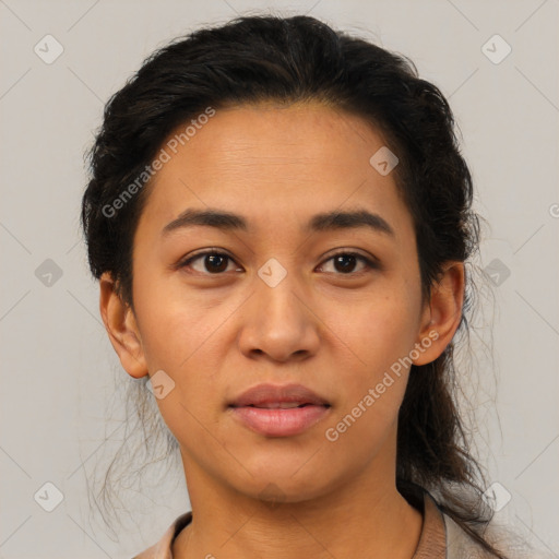 Joyful latino young-adult female with short  brown hair and brown eyes