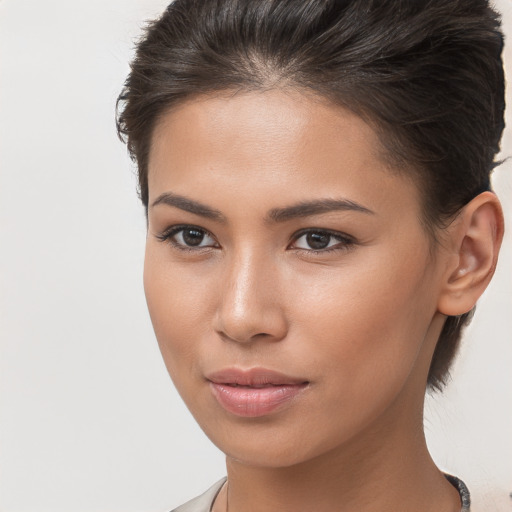 Neutral white young-adult female with long  brown hair and brown eyes