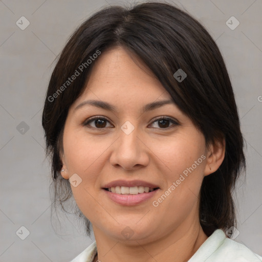 Joyful white adult female with medium  brown hair and brown eyes