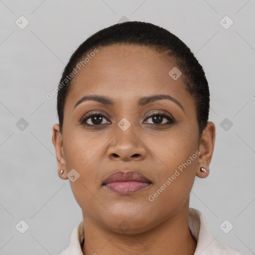 Joyful black young-adult female with short  brown hair and brown eyes