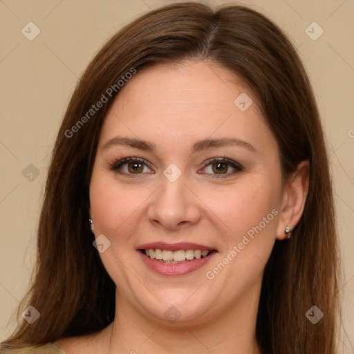 Joyful white young-adult female with long  brown hair and green eyes