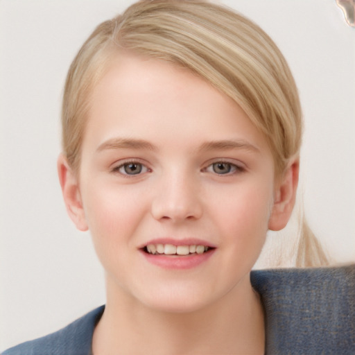 Joyful white child female with short  brown hair and grey eyes