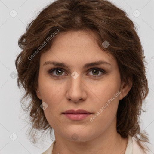 Joyful white young-adult female with medium  brown hair and green eyes