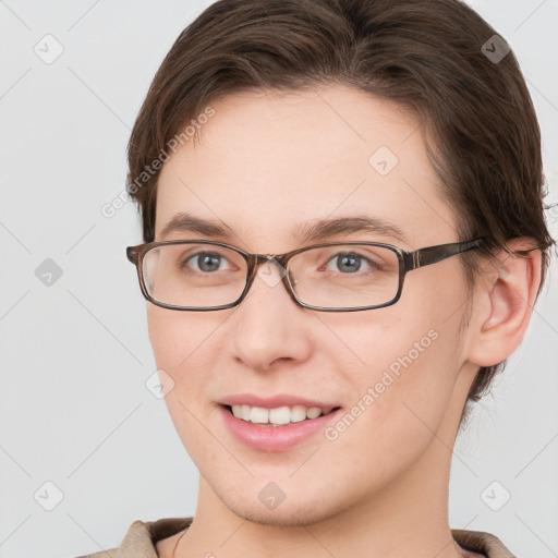 Joyful white young-adult female with medium  brown hair and grey eyes