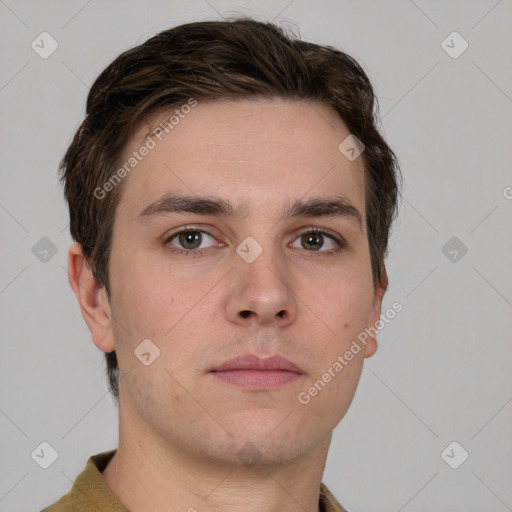 Neutral white young-adult male with short  brown hair and grey eyes