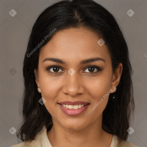 Joyful black young-adult female with medium  brown hair and brown eyes