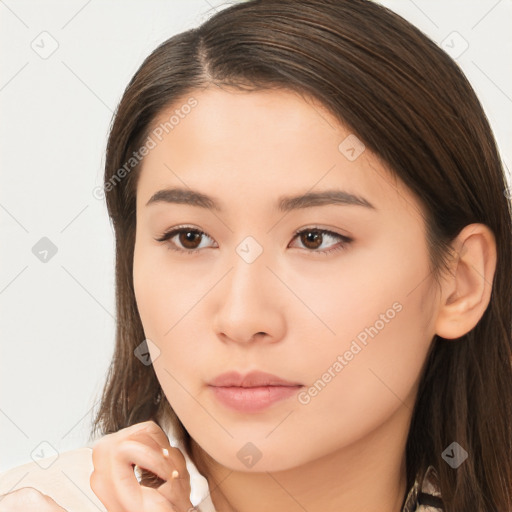 Neutral white young-adult female with long  brown hair and brown eyes