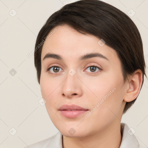 Neutral white young-adult female with short  brown hair and brown eyes