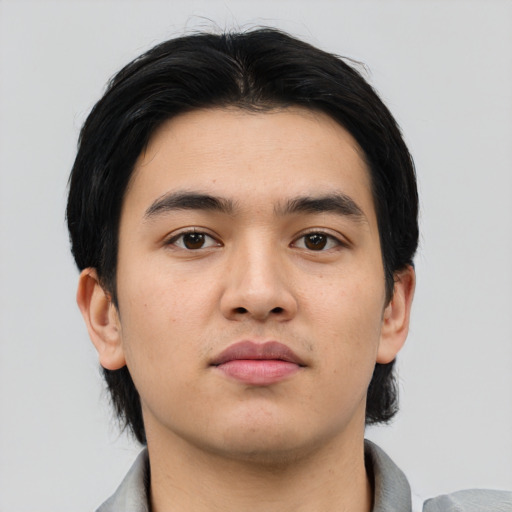 Neutral asian young-adult male with short  black hair and brown eyes