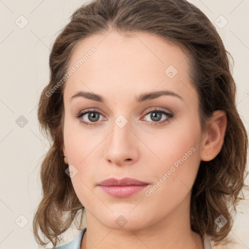 Joyful white young-adult female with medium  brown hair and green eyes