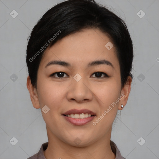 Joyful asian young-adult female with short  black hair and brown eyes