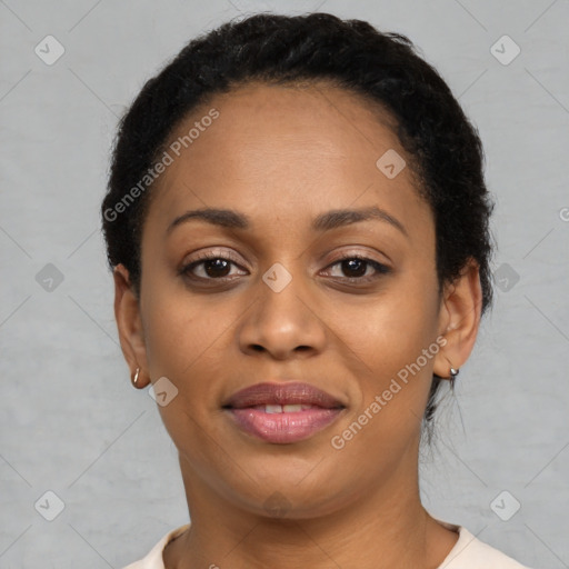 Joyful latino young-adult female with short  black hair and brown eyes