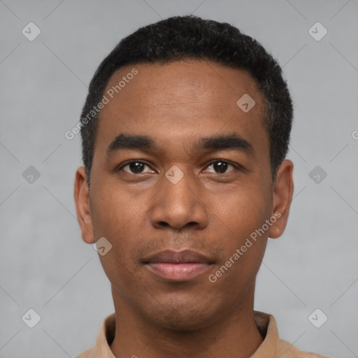 Neutral latino young-adult male with short  black hair and brown eyes