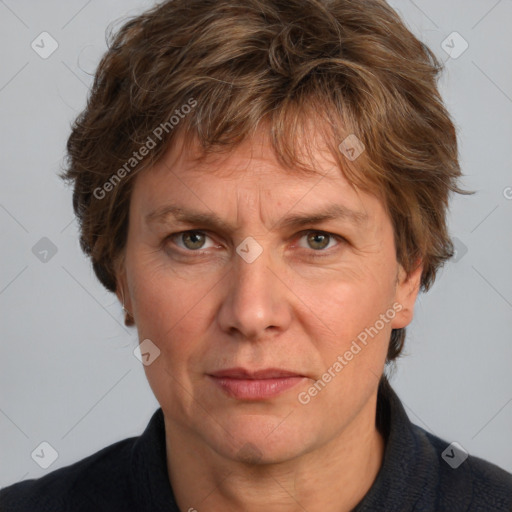 Joyful white adult male with medium  brown hair and grey eyes