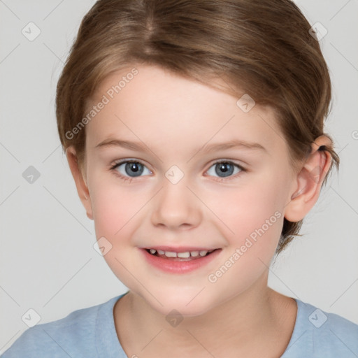 Joyful white child female with short  brown hair and grey eyes